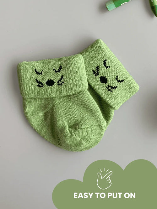 Air Garb high-quality cotton baby combo socks for ages 0-1 years; features lime green, royal blue, and deep purple with embroidered kitten faces on the cuffs.